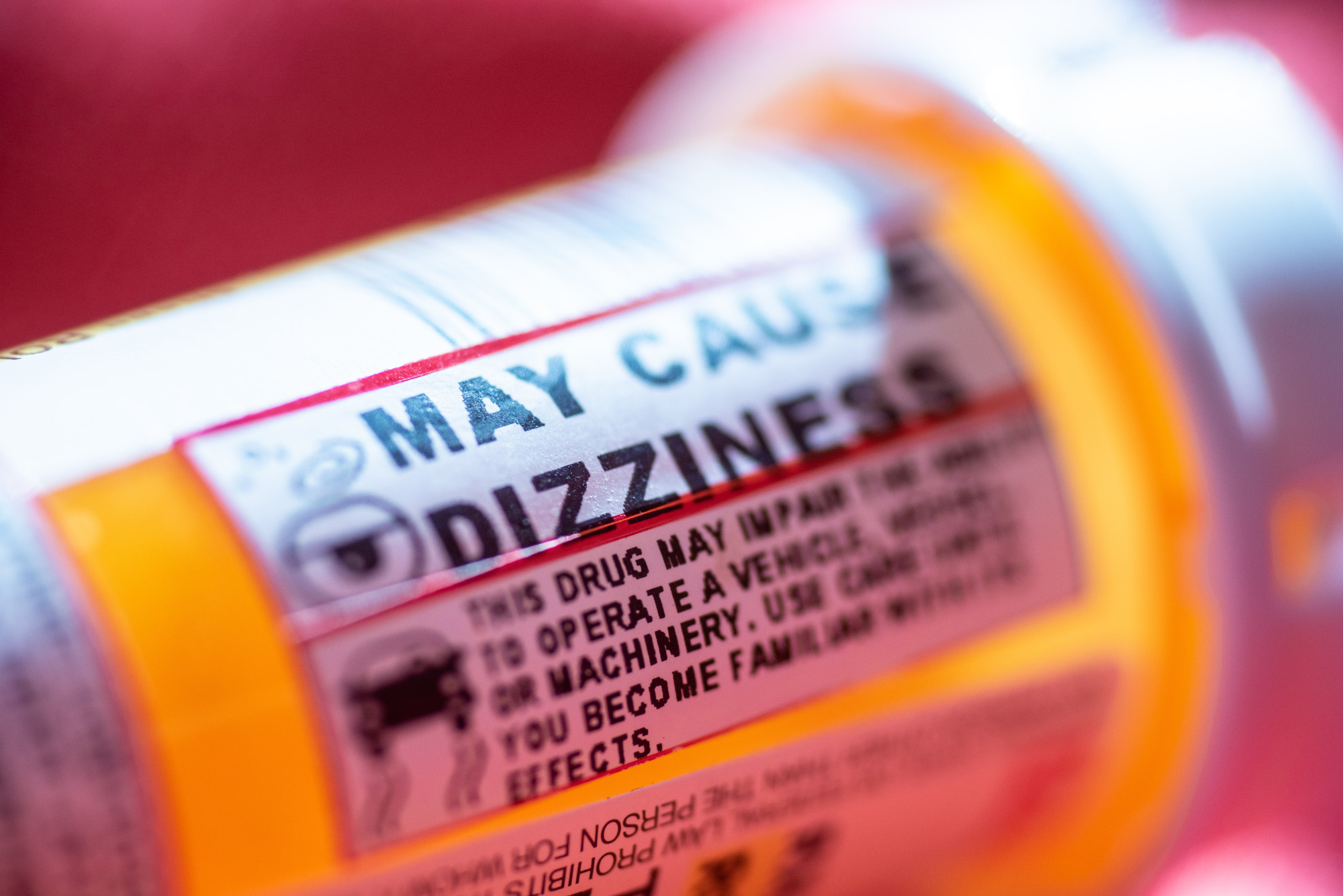 A prescription bottle that carries a warning about not mixing medications with alcohol.