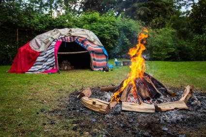 Traditional native sweat lodge with hot stones