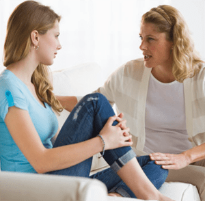 Photo of mother and daughter talking