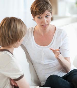 Photo of mother speaking to child