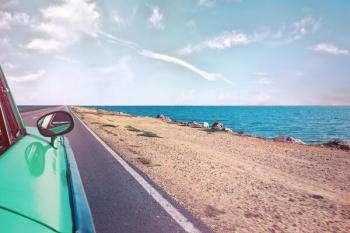 Car driving near a beach 