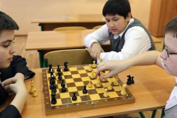 Kids playing chess