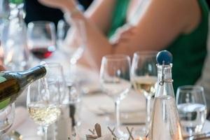 Photo of bottles and glasses of drinks on a table