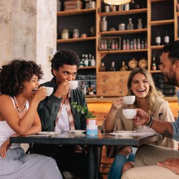 Friends drinking coffee at a coffee shop